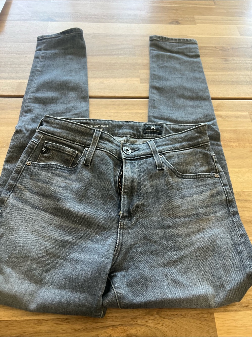 AG skinny jeans in wash light grey